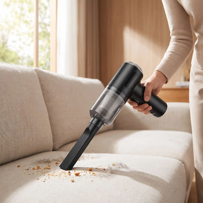 Mini aspirateur Rechargeable USB nettoyant un canapé