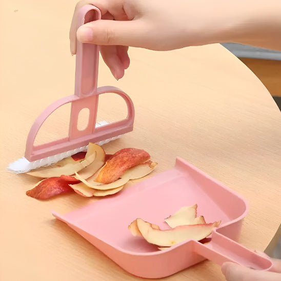 balayette et pelle ramasse pelures pommes