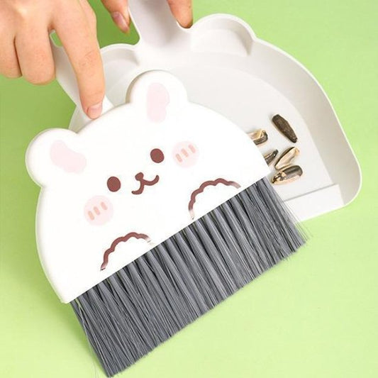 pelle et balayette forme ours nettoyage miettes